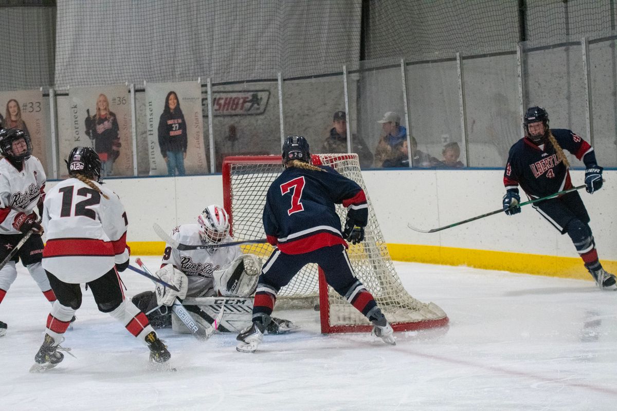 Tiger girls’ hockey remains unbeaten; Austinson scores 100th career po...