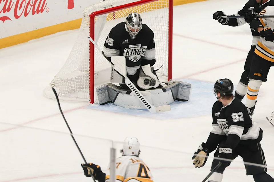 Goaltender Darcy Kuemper #35 of the Los Angeles Kings makes a glove save during an NHL hockey game against the Boston Bruins, Friday November 21, 2025 in Los Angeles, Calif.