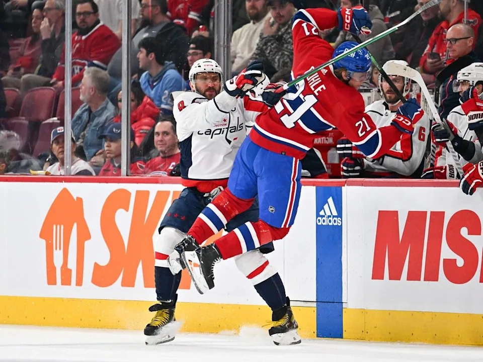  Washington Capitals’ Alex Ovechkin checks Canadiens defenceman Kaiden Guhle during the first period at the Bell Centre in Montreal on Feb. 17.
