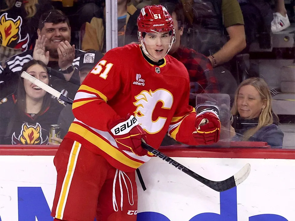  Calgary Flames forward Matvei Gridin scores on Winnipeg Jets goalie Connor Hellebuyck in first-period preseason NHL action in October.