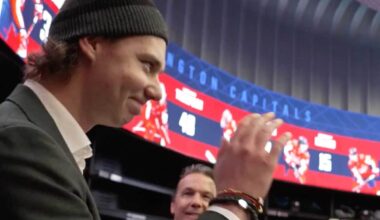 Bogdan Trineyev gets ovation from Caps players in locker room after Spencer Carbery’s postgame victory speech