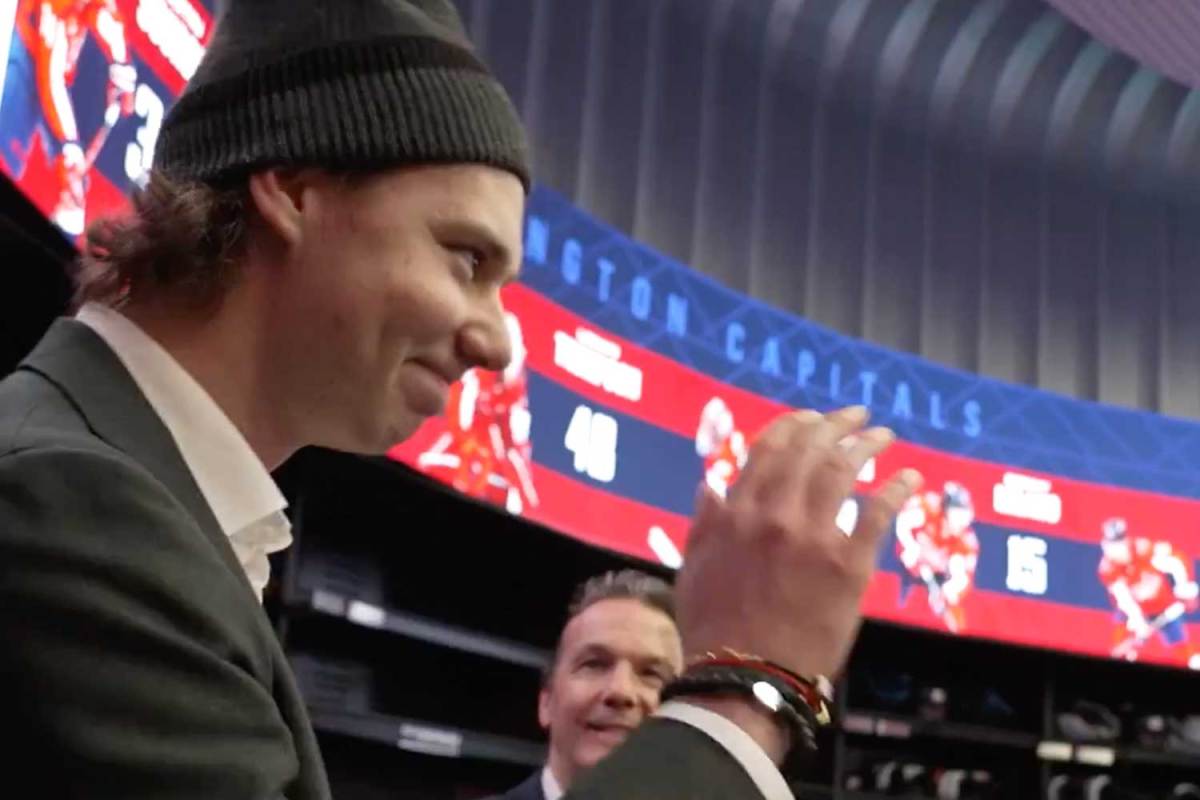 Bogdan Trineyev gets ovation from Caps players in locker room after Spencer Carbery’s postgame victory speech