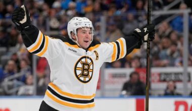 Boston Bruins' Charlie McAvoy (73) celebrates after scoring during the third period of an NHL hockey game against the St. Louis Blues Tuesday, Nov. 12, 2024, in St. Louis. (AP Photo/Jeff Roberson)