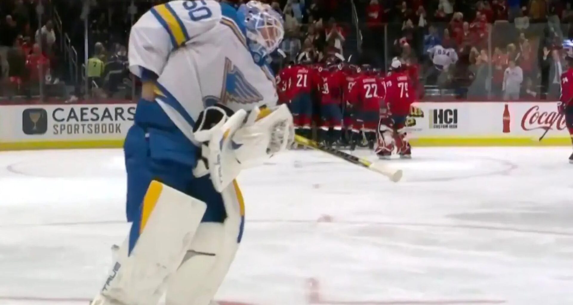 Moment opposing NHL goalie attempts to steal Alex Ovechkin's puck from historic 900th goal