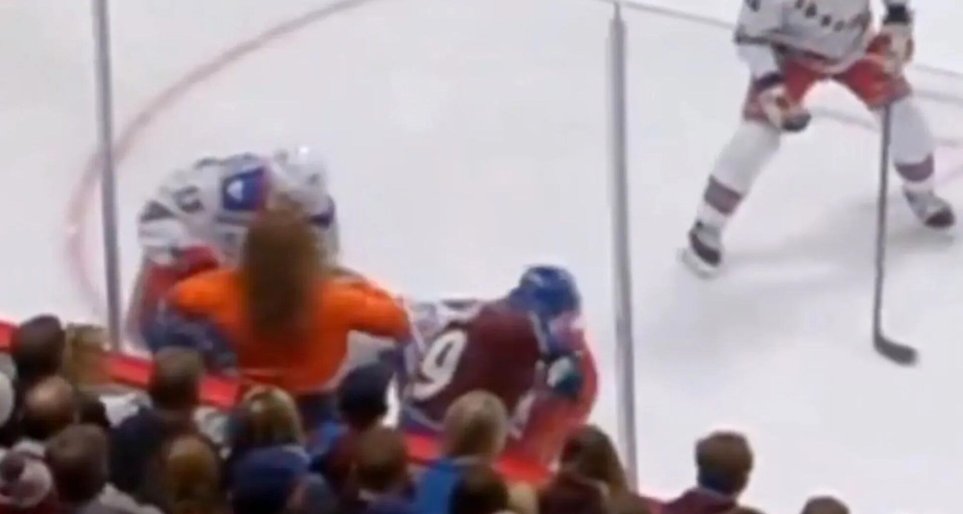 Female NHL fan flashes players at Rangers-Avalanche game from front row as fans gasp at 'distraction'
