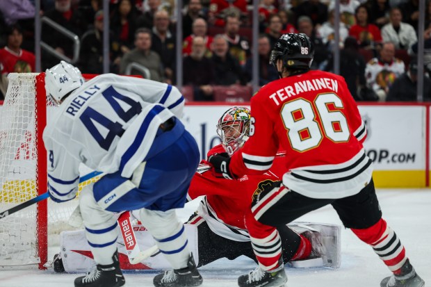 Toronto Maple Leafs defenseman Morgan Rielly (44) scores a goal past Chicago Blackhawks goaltender Spencer Knight (30) during the second period at the United Center Saturday Nov. 15, 2025 in Chicago. (Armando L. Sanchez/Chicago Tribune)