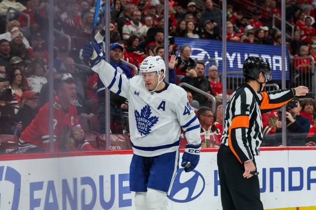 Toronto Maple Leafs defenseman Morgan Rielly (44) celebrates after scoring a goal past Chicago Blackhawks goaltender Spencer Knight (30) during the second period at the United Center Saturday Nov. 15, 2025 in Chicago. (Armando L. Sanchez/Chicago Tribune)