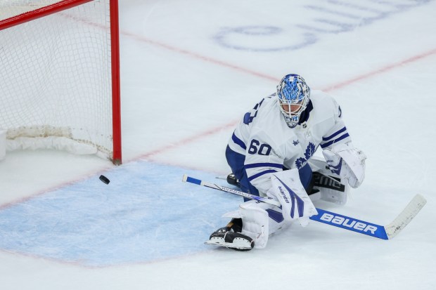 Chicago Blackhawks center Colton Dach (34) scores a goal past Toronto Maple Leafs goaltender Joseph Woll (60) during the third period at the United Center Saturday Nov. 15, 2025 in Chicago. (Armando L. Sanchez/Chicago Tribune)