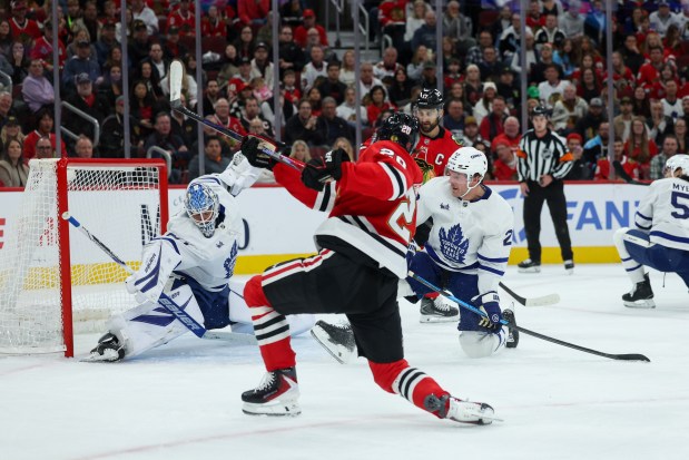 Chicago Blackhawks center Ryan Greene (20) shoots a goal past Toronto Maple Leafs goaltender Joseph Woll (60) during the first period at the United Center Saturday Nov. 15, 2025 in Chicago. (Armando L. Sanchez/Chicago Tribune)