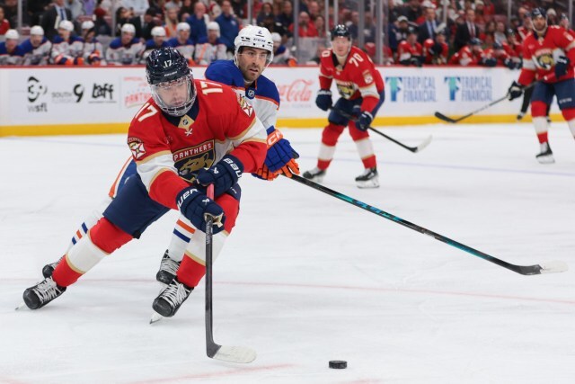 Evan Rodrigues attempts to keep the puck away from Evan Bouchard during Saturday's 2025 Stanley Cup Final rematch.