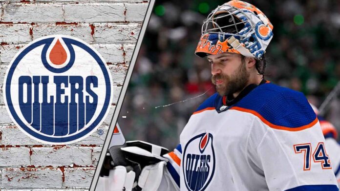 Edmonton Oilers goalie Stuart Skinner looks dejected during a game, highlighting the team's need for a goaltending upgrade.