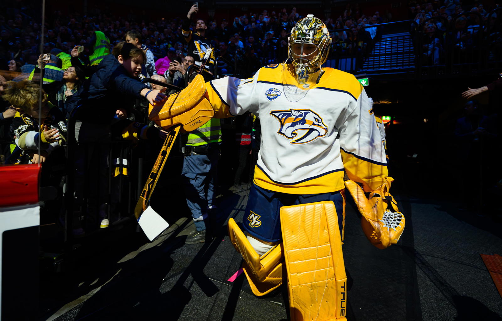 Nov 16, 2025; Stockholm, SWEDEN; Nashville Predators goaltender Juuse Saros (74) heads to the ice before playing against the Pittsburgh Penguins in a Global Series ice hockey game at Avicii Arena. Mandatory Credit: Per Haljestam-Imagn Images