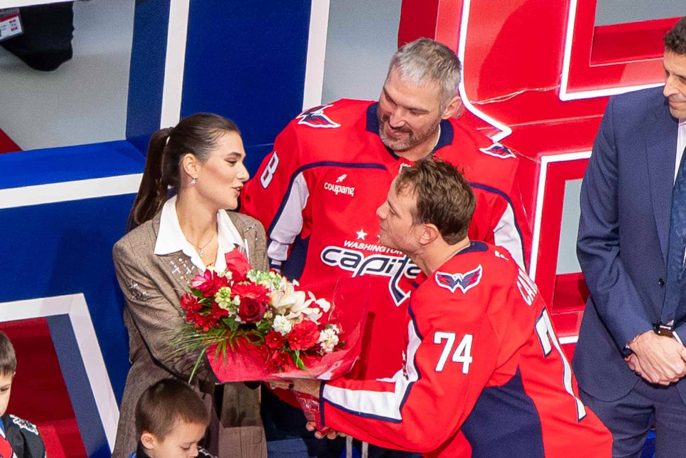 John Carlson gives flowers to Nastya Ovechkina