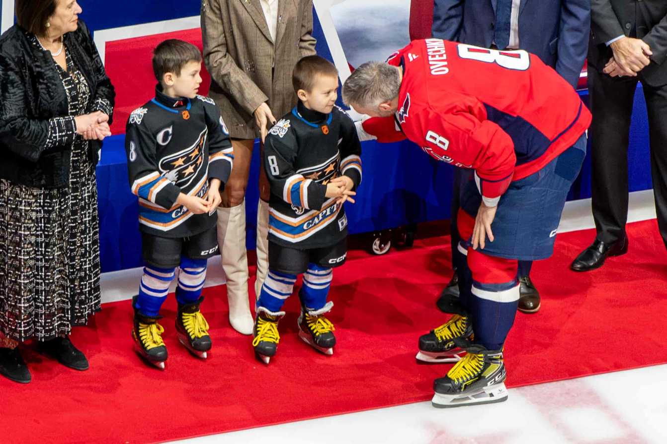 Alex Ovechkin greets his children Sergei and Ilya