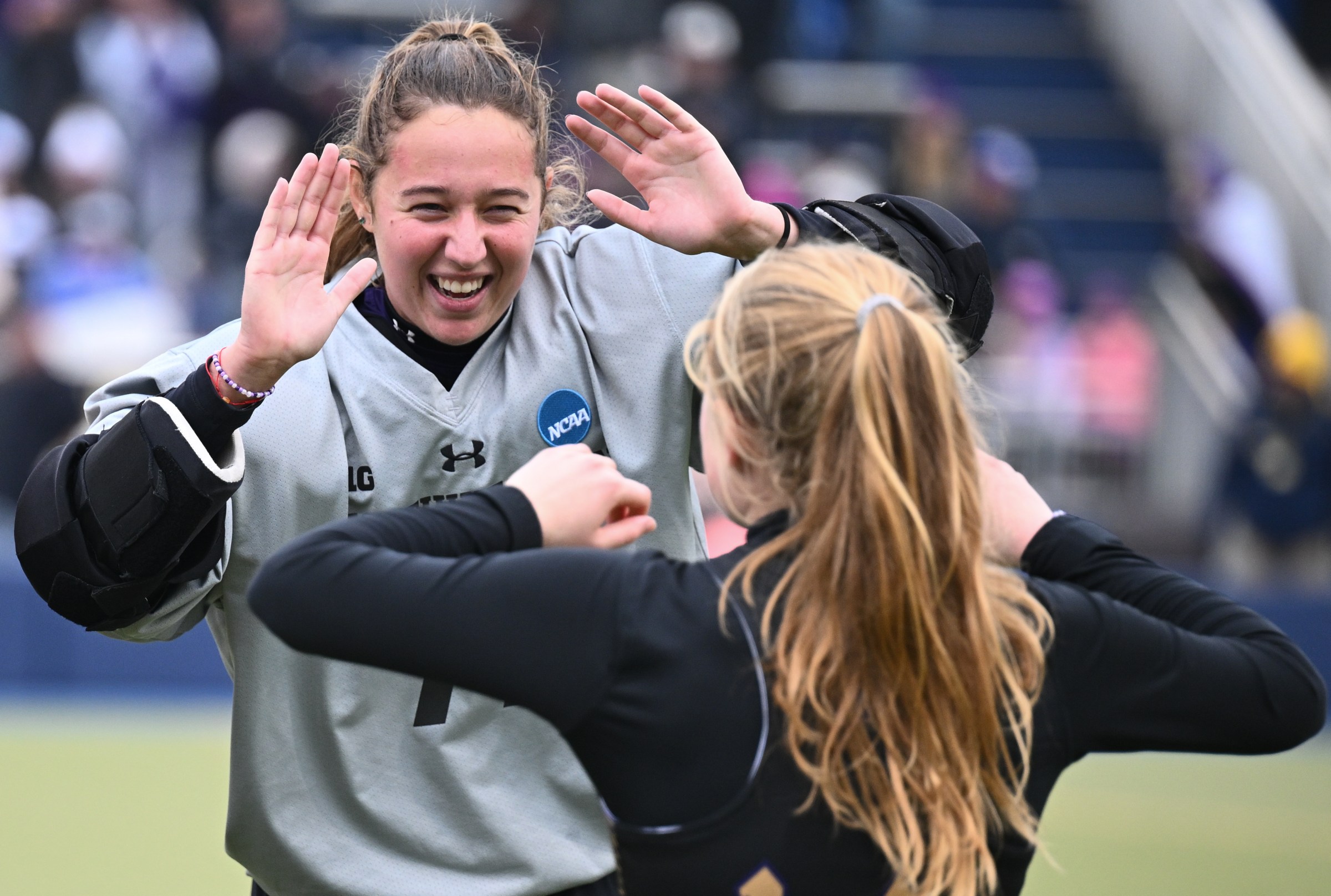 ANN ARBOR, MICHIGAN - NOVEMBER 24: Juliana Boon #77 of Northwestern Wildcats high fives teammates before the game against the Saint Joseph’s Hawks during the Division I Womens Field Hockey Championship held at the Phyllis Ocker Field Hockey Complex on November 24, 2024 in Ann Arbor, Michigan. (Photo by Tim Fuller/NCAA Photos via Getty Images)