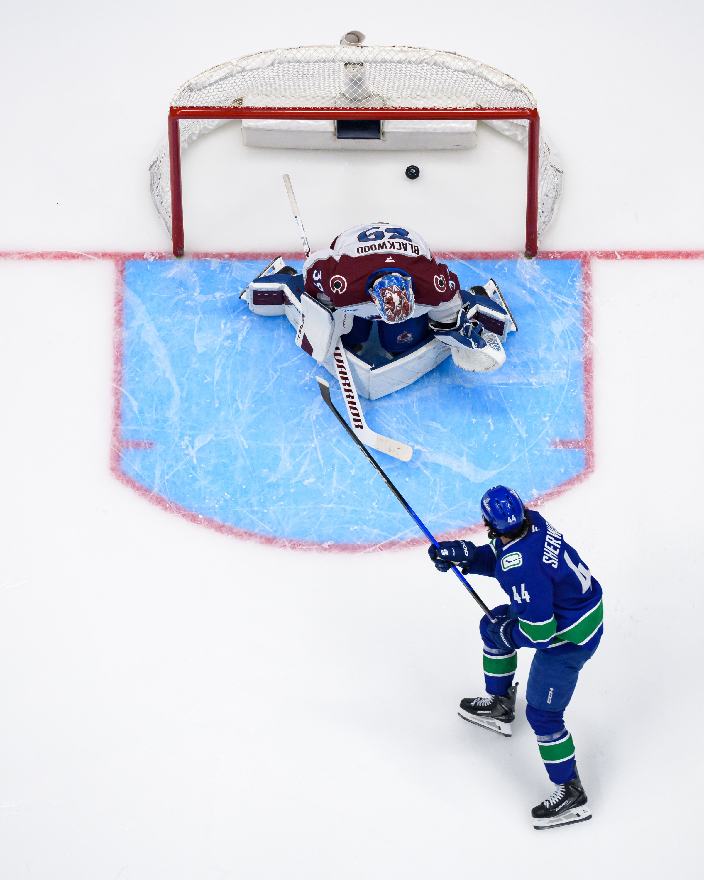 VANCOUVER, CANADA - NOVEMBER 9: Kiefer Sherwood #44 of the Vancouver Canucks scores a goal on Mackenzie Blackwood #39 of the Colorado Avalanche during the second period of their NHL game at Rogers Arena on November 9, 2025 in Vancouver, British Columbia, Canada. (Photo by Derek Cain/Getty Images)