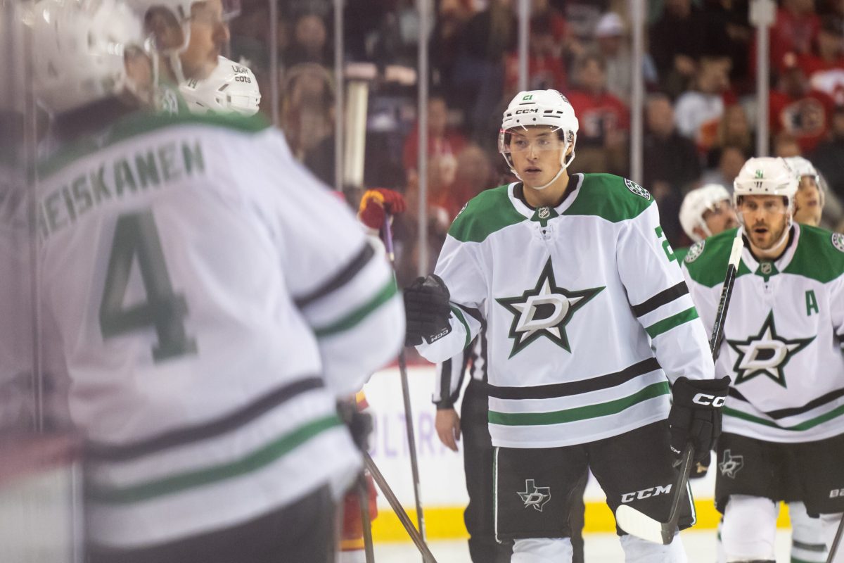 Nov 22, 2025; Calgary, Alberta, CAN; Dallas Stars left wing Jason Robertson (21) celebrates a goal against the Calgary Flames during the third period at Scotiabank Saddledome. Mandatory Credit: Brett Holmes-Imagn Images