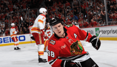 Bedard stays hot with hat trick, Blackhawks defeat Flames