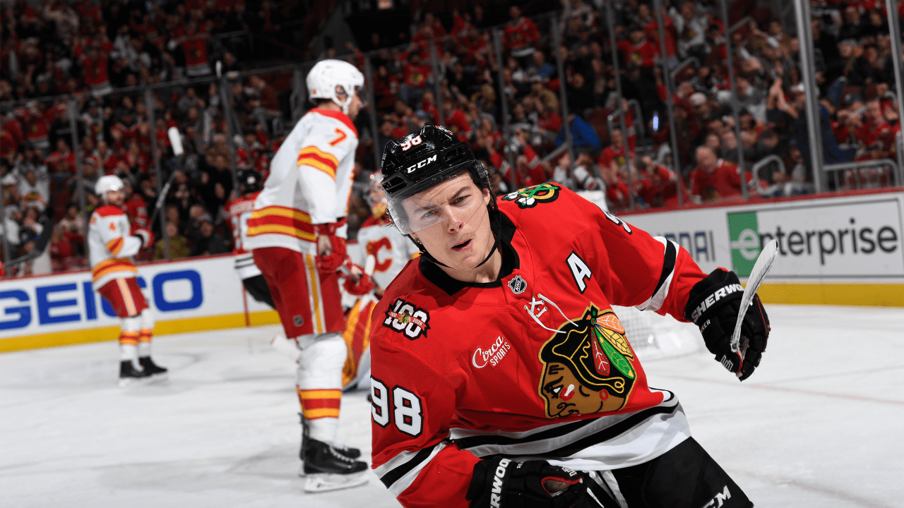 Bedard stays hot with hat trick, Blackhawks defeat Flames