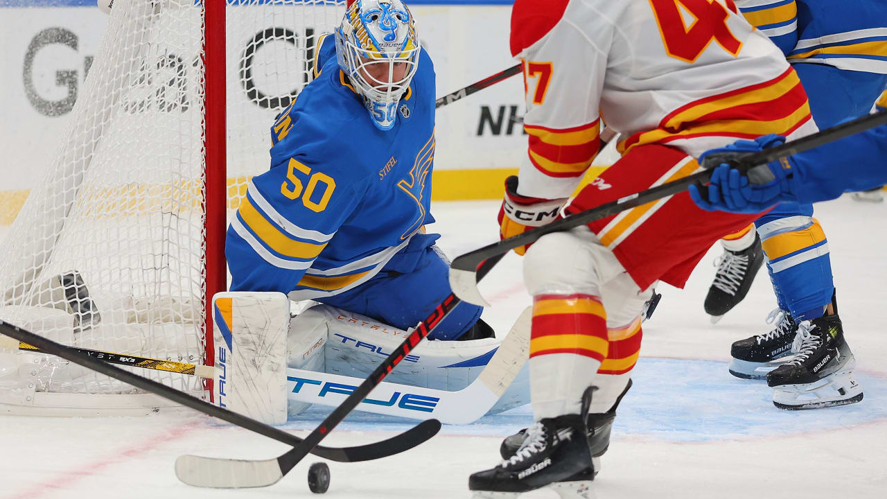 Binnington makes 38 saves, Blues edge Flames