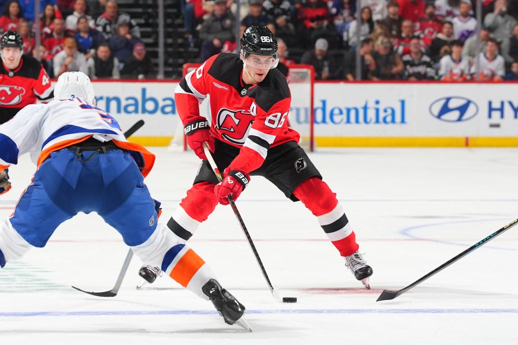 Jack Hughes #86 of the New Jersey Devils skates during the third period of a game against the New York Islanders.