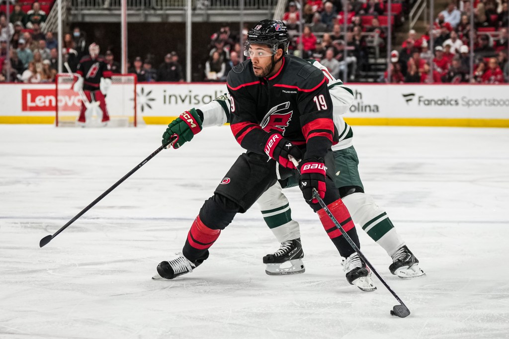 K'Andre Miller #19 of the Carolina Hurricanes skates during the first period against the Minnesota Wild.