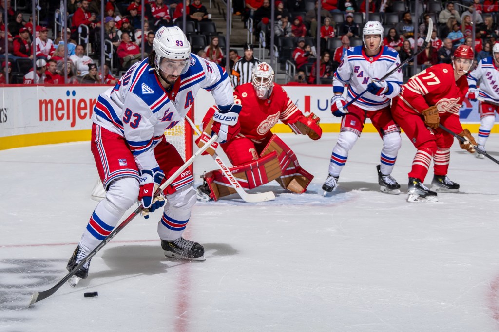 Mika Zibanejad of the New York Rangers controls the puck during a power play against the Detroit Red Wings.
