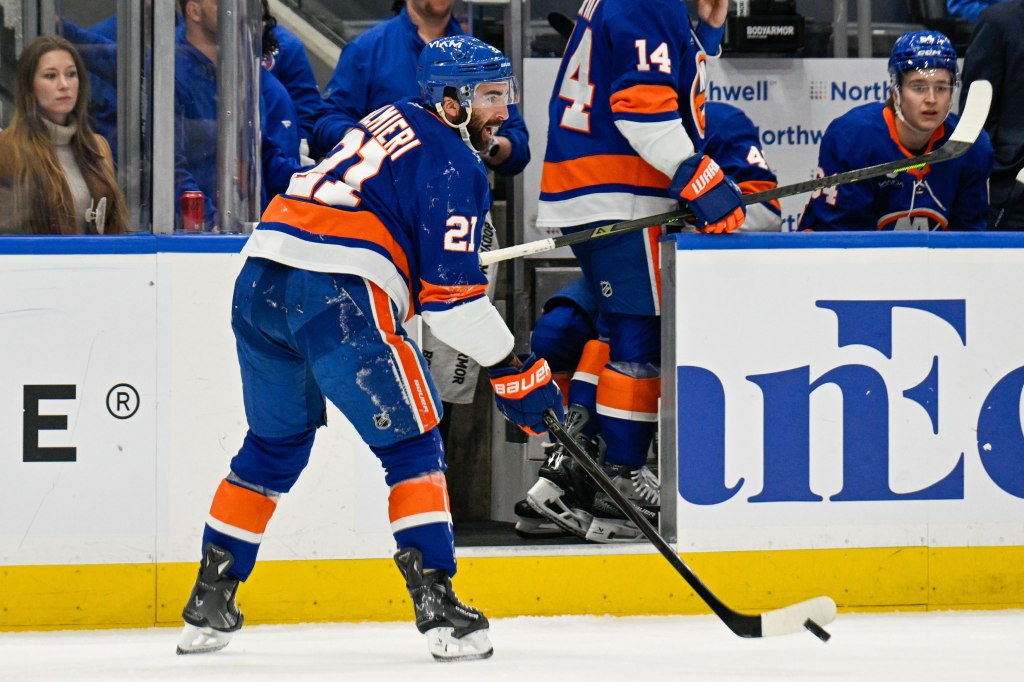 New York Islanders center Kyle Palmieri (21) makes a pass after being injured against the Philadelphia Flyers during the second period.
