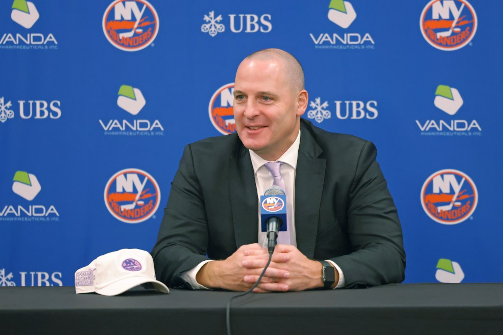 New York Islanders GM Mathieu Darche speaking at a press conference.