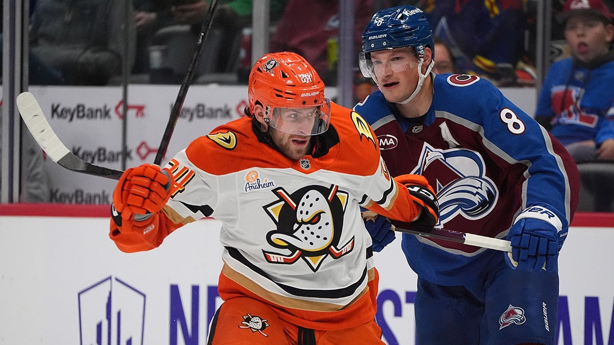 Cale Makar checks Jansen Harkins