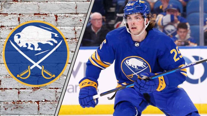 Buffalo Sabres defenseman Owen Power skating with the puck, analyzing trade rumors and defensive performance.