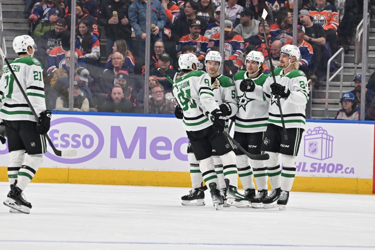 Nov 25, 2025; Edmonton, Alberta, CAN; Dallas Stars platers celebrate a goal on the Edmonton Oilers during the first period at Rogers Place. Mandatory Credit: Walter Tychnowicz-Imagn Images