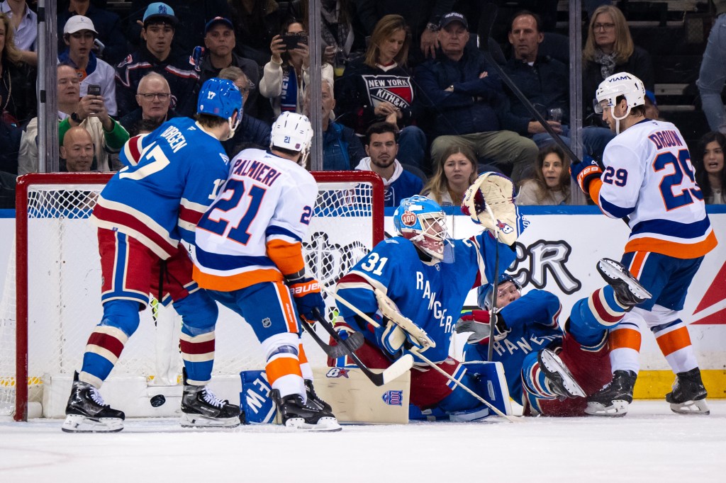 New York Rangers goaltender Igor Shesterkin (31) surrenders a goal to the New York Islanders.