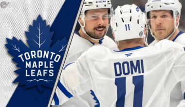 An intense-looking Toronto Maple Leafs player Max Domi skating during an NHL game, representing a potential trade chip.