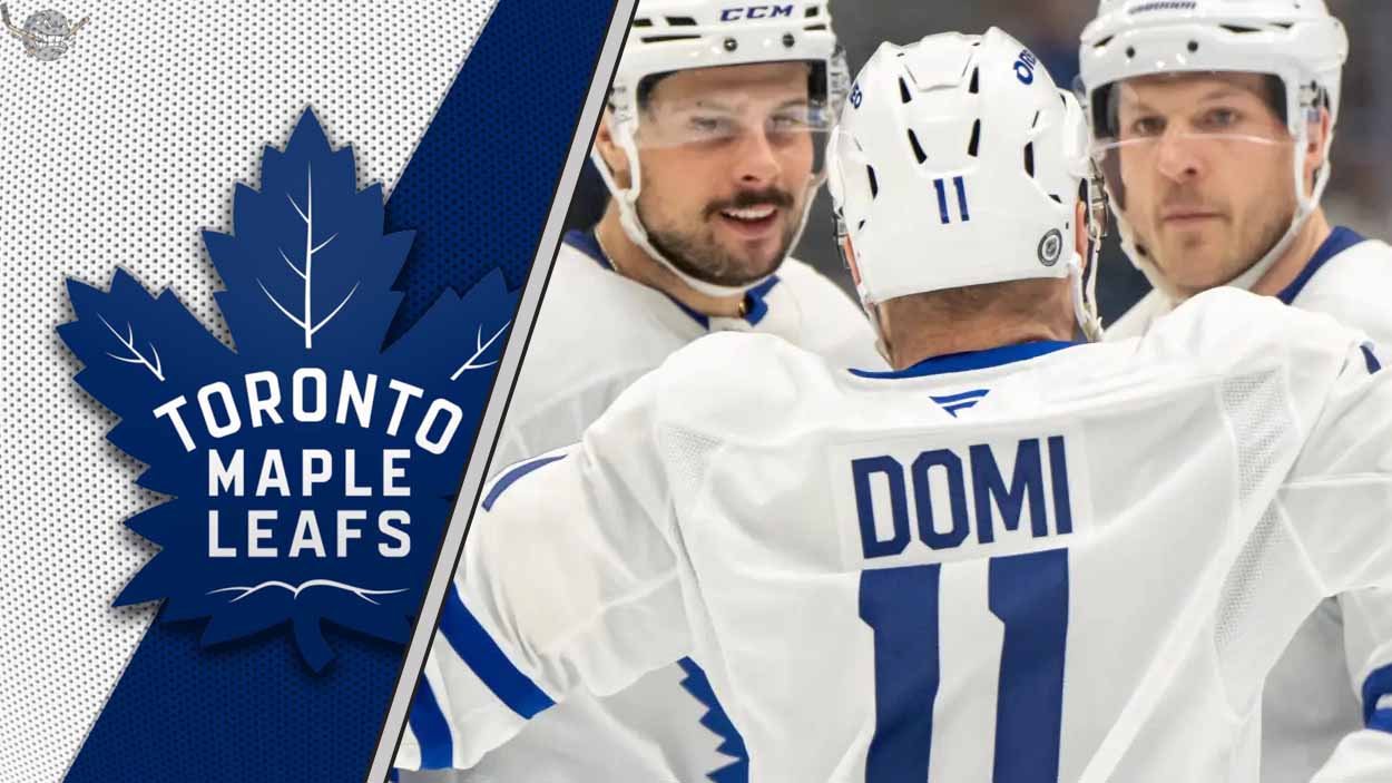 An intense-looking Toronto Maple Leafs player Max Domi skating during an NHL game, representing a potential trade chip.