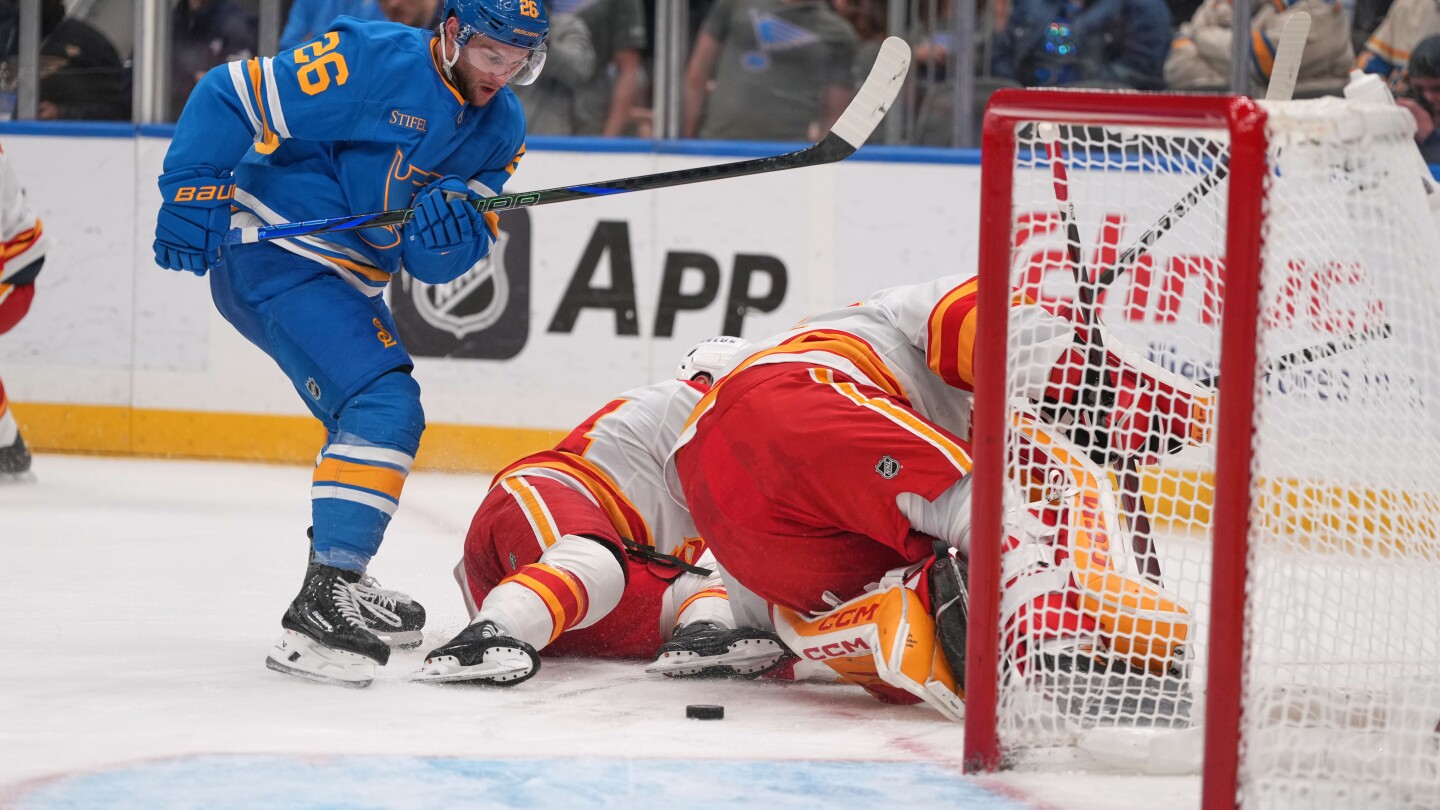 Walker, Binnington lead Blues to 3-2 win over Flames