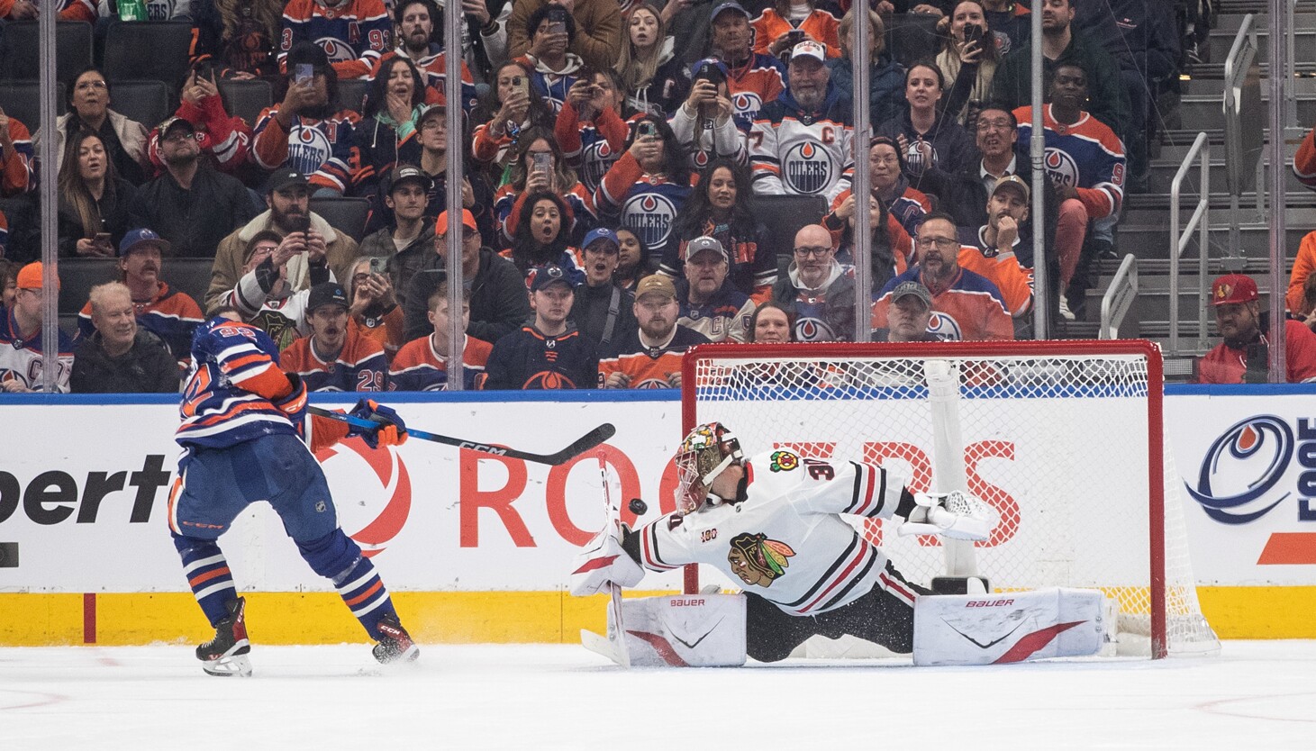 Blackhawks lose in overtime in front of distracted Oilers crowd