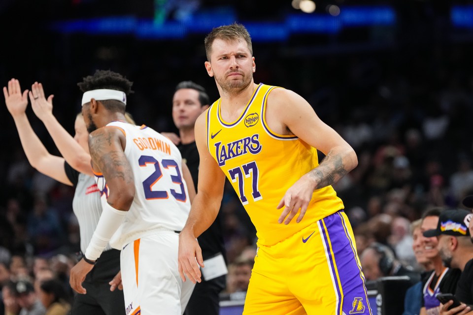 Luka Doncic reacts during the first half of the preseason NBA game against the Phoenix Suns at Mortgage Matchup Center on October 14, 2025 in Phoenix, Arizona. The Suns defeated the Lakers 113-104. 