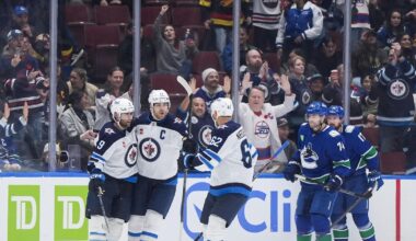 Morrissey and Hellebuyck lead Jets past Canucks 5-3 to halt 3-game slide