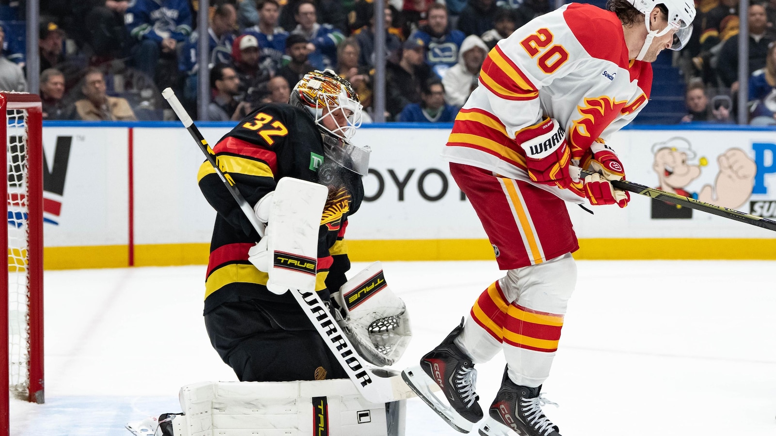 Flames beat Canucks 5-2 to finish back-to-back set with 3rd straight win