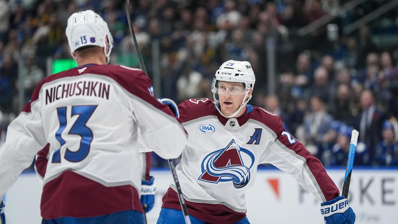 Brindley scores in OT, MacKinnon has 2 goals and 3 assists as Avalanche beat Canucks 5-4
