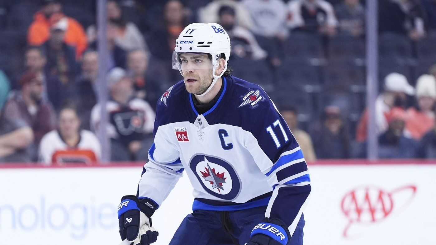 Jets fans react as Winnipeg locks in captain Adam Lowry for five more years