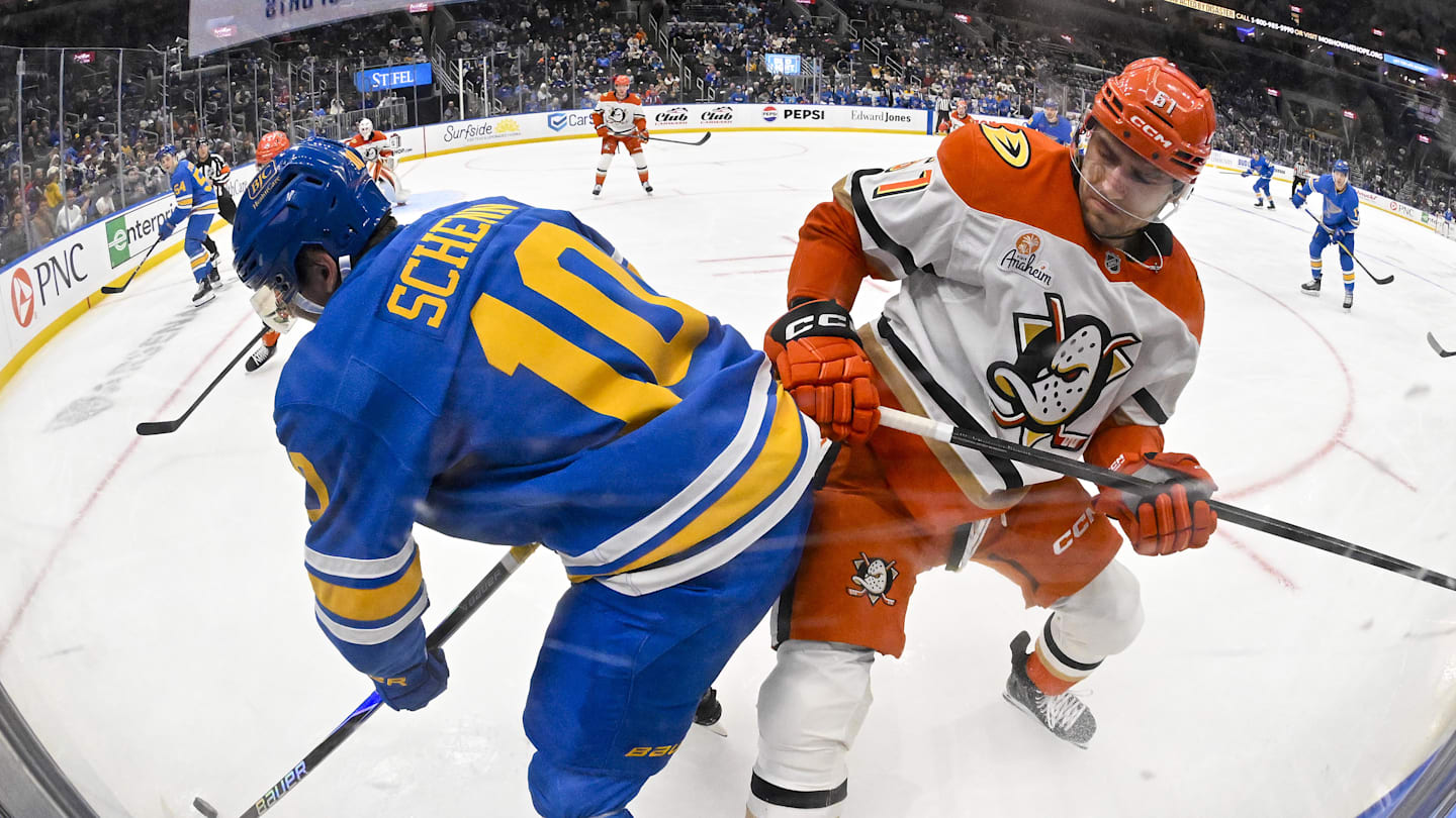 Dec 1, 2025; St. Louis, Missouri, USA; St. Louis Blues center Brayden Schenn (10) and Anaheim Ducks left wing Cutter Gauthier (61) battle for the puck during the second period at Enterprise Center. Mandatory Credit: Jeff Curry-Imagn Images