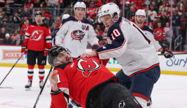 Blue Jackets forward Dmitri Voronkov fights Devils forward Stefan Noesen.