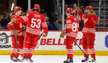 Dec 2, 2025; Detroit, Michigan, USA;  Detroit Red Wings left wing Lucas Raymond (23) receives congratulations from teammates after scoring in the third period against the Boston Bruins at Little Caesars Arena. Mandatory Credit: Rick Osentoski-Imagn Images