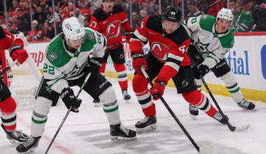 Dec 3, 2025; Newark, New Jersey, USA; New Jersey Devils defenseman Dennis Cholowski (44) plays the puck away from Dallas Stars center Mavrik Bourque (22) during the first period at Prudential Center. Mandatory Credit: Ed Mulholland-Imagn Images