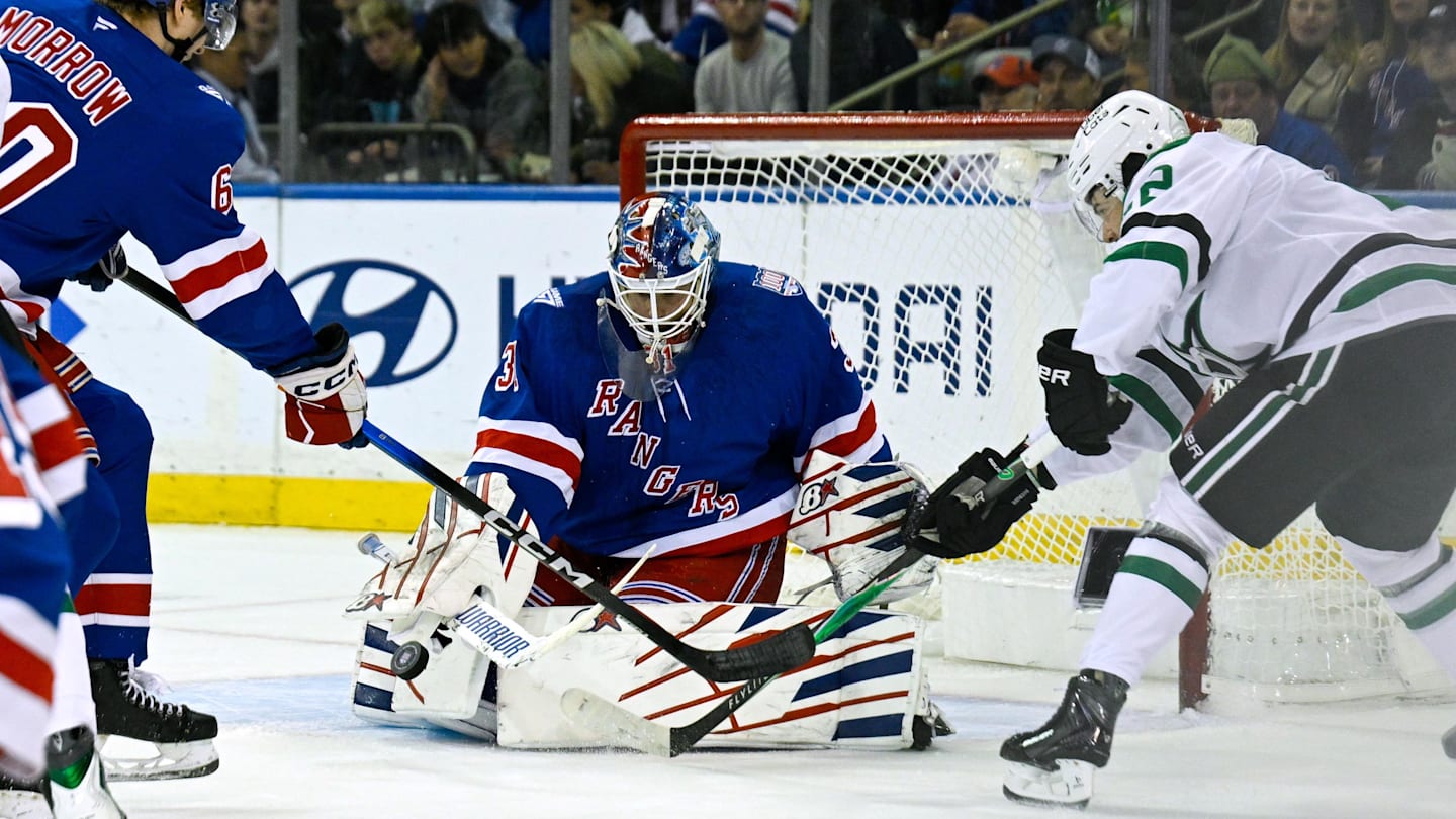 Dec 2, 2025; New York, New York, USA;  New York Rangers goaltender Igor Shesterkin (31) makes a save as New York Rangers defenseman Scott Morrow (60) defends against Dallas Stars center Mavrik Bourque (22) during the second period at Madison Square Garden. Mandatory Credit: Dennis Schneidler-Imagn Images