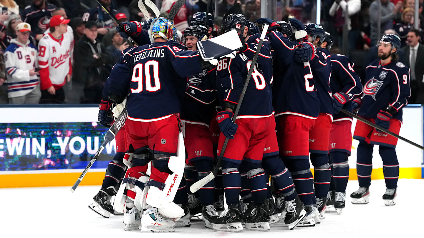 The Columbus Blue Jackets celebrate their win over the Detroit Red Wings on Thursday night.