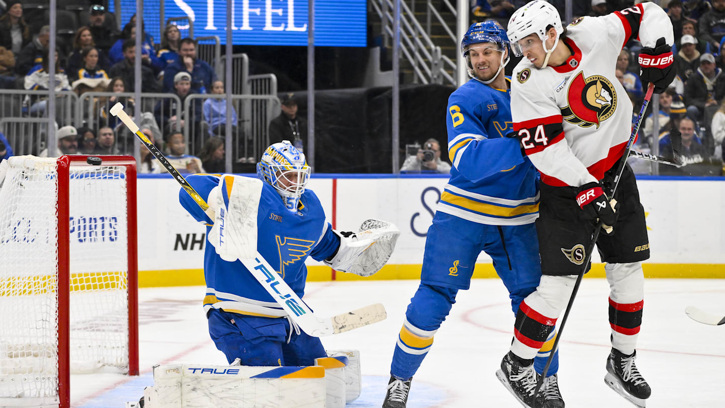 Nov 28, 2025; St. Louis, Missouri, USA; St. Louis Blues goaltender Jordan Binnington (50) and defenseman Philip Broberg (6) defend the net against Ottawa Senators center Dylan Cozens (24) during the third period at Enterprise Center. Mandatory Credit: Jeff Curry-Imagn Images