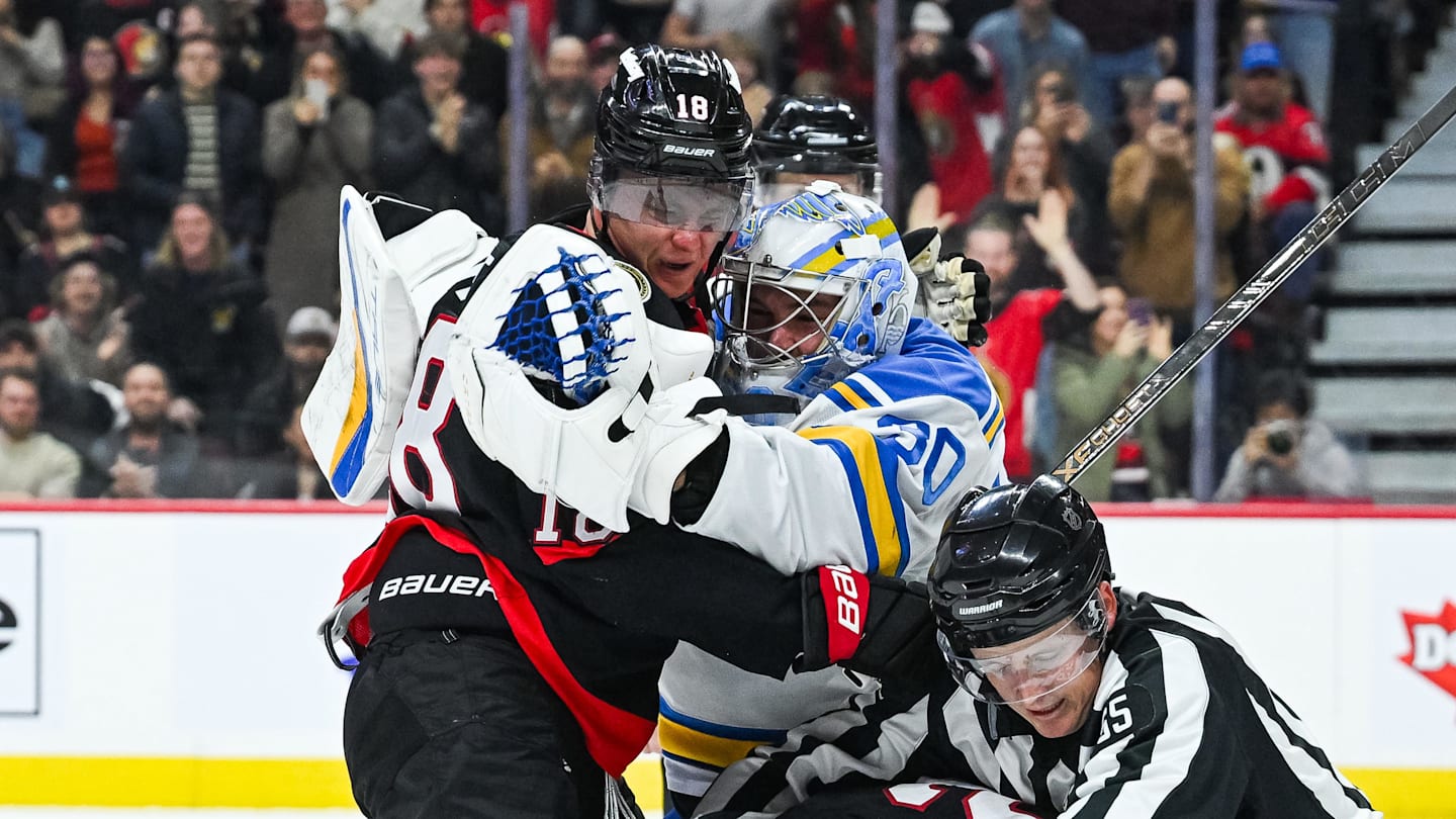 Dec 6, 2025; Ottawa, Ontario, CAN; St. Louis Blues goalie Joel Hofer (30) fights against Ottawa Senators center Tim Stutzle (18) during the third period at Canadian Tire Centre. Mandatory Credit: David Kirouac-Imagn Images